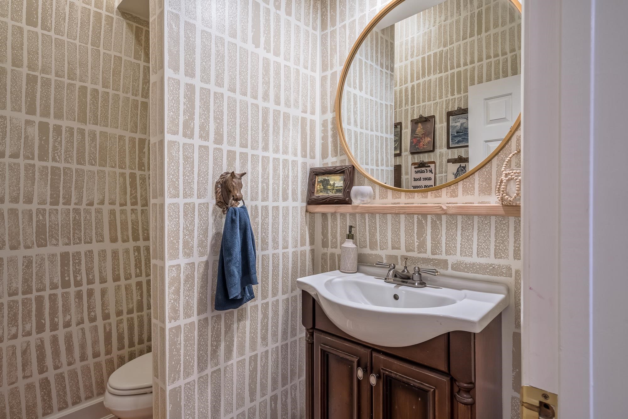 810 West Tree Cove Collierville, TN 38017 - Photo 9 of 25 a bathroom with a sink a toilet and shower