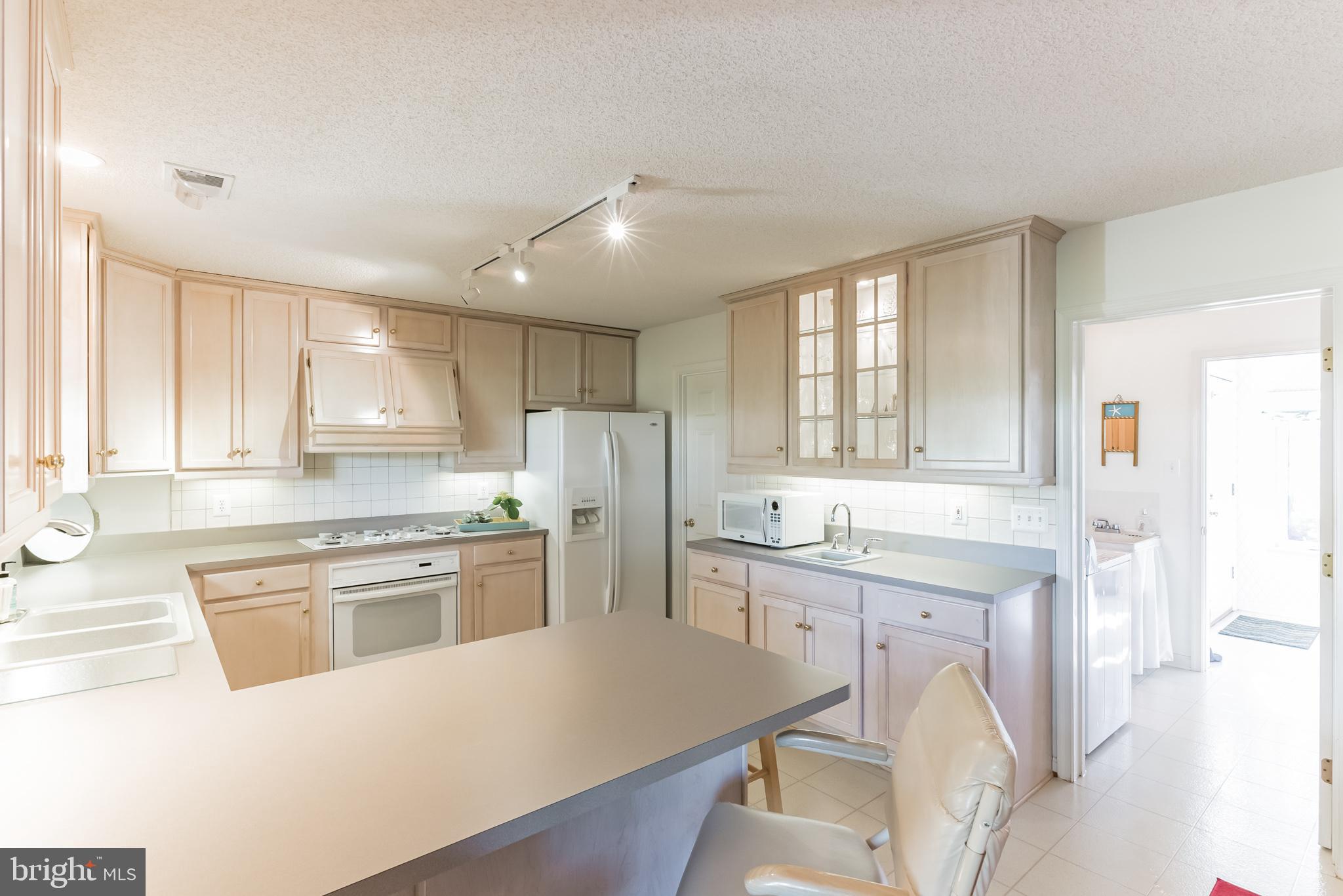48591 Bean Road Ridge, MD 20680 - Photo 10 of 31 kitchen adjoins mud room/laundry/half bath