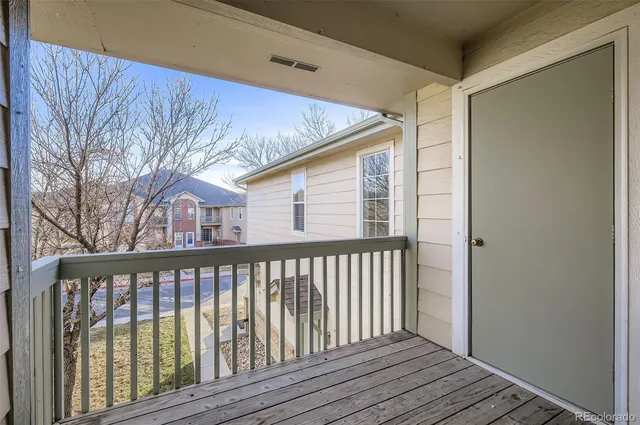 a front view of a house with a wooden floor