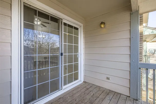 a view of a door and a window