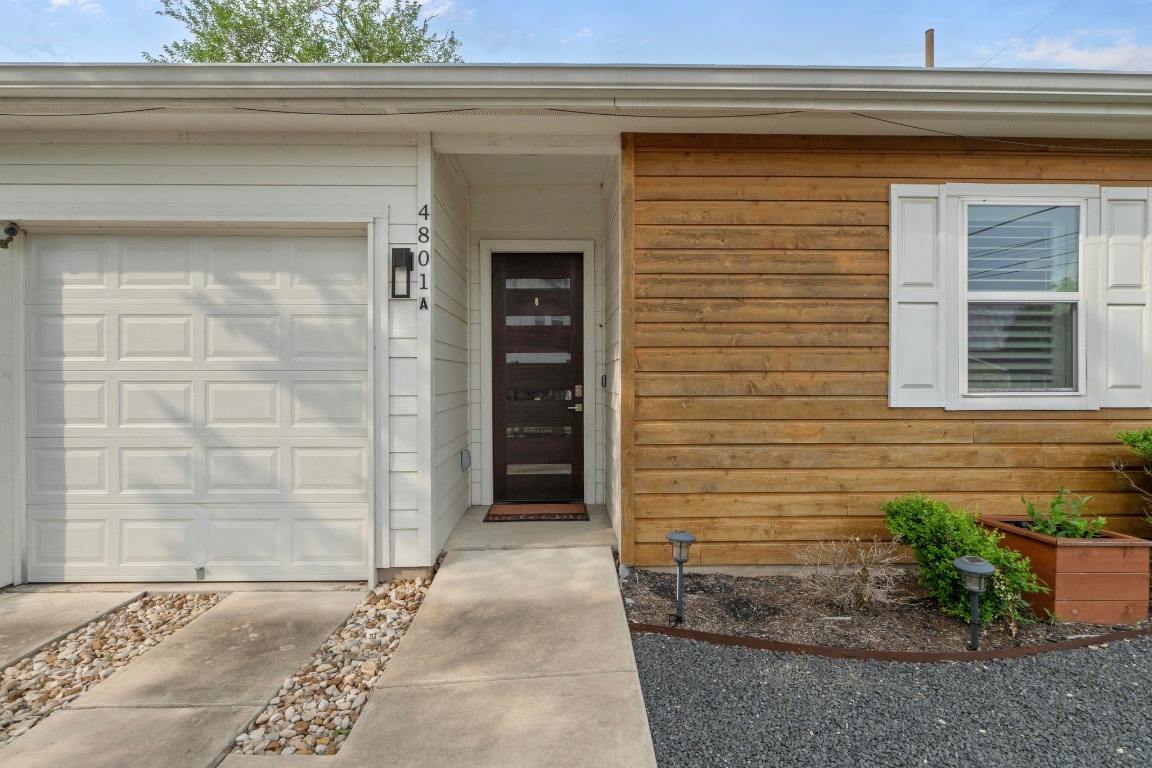 4801 Louis Avenue, Unit 1 Austin, TX 78721 - Photo 4 of 26 Entrance to property featuring a garage