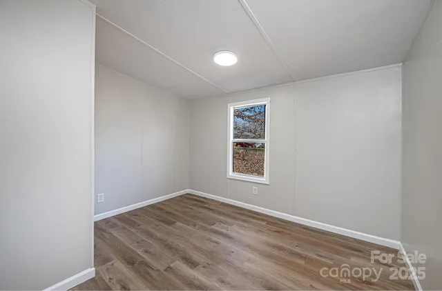 a view of a room with a window