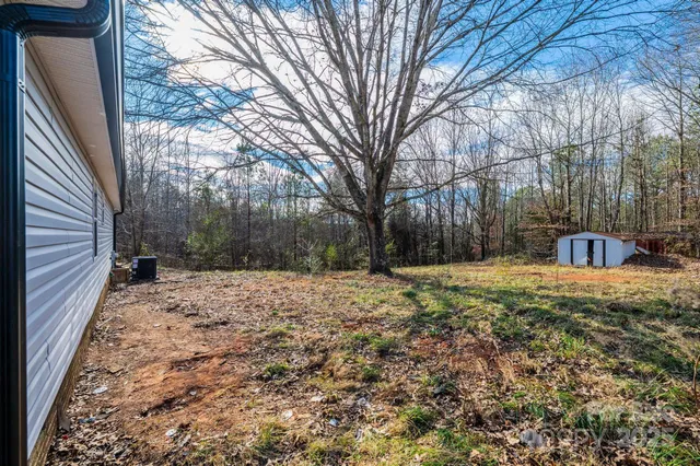 a fire hydrant in the middle of a yard