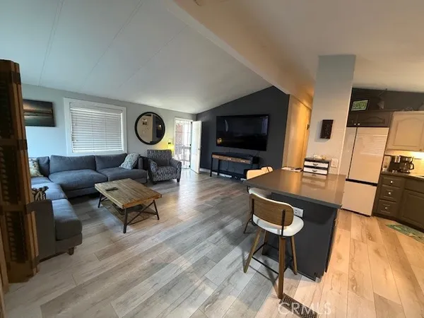 a view of room with furniture and a window