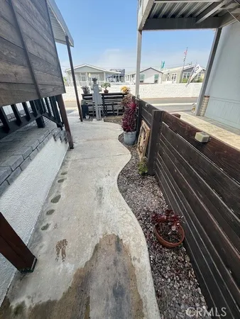 a view of a chairs and tables in patio