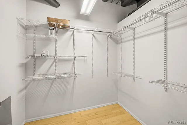 a view of a room with racks on the wall