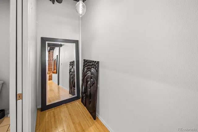 a view of a storage & utility room with a sink