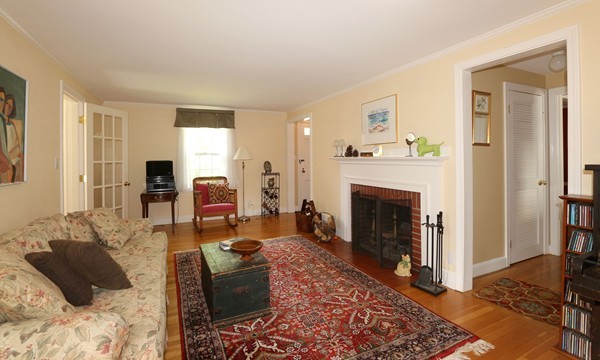 43 Boulder Brook Road Wellesley, MA 02481 - Photo 2 of 23 a living room with furniture and a fireplace