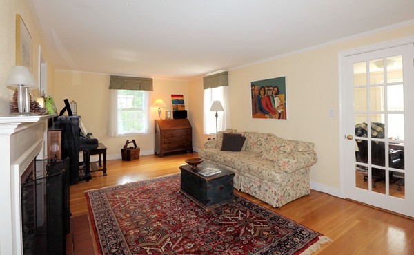 43 Boulder Brook Road Wellesley, MA 02481 - Photo 3 of 23 a living room with furniture and a flat screen tv
