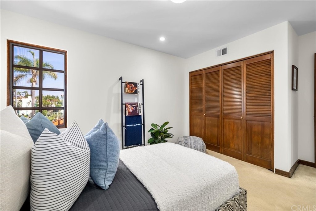 263 Park Avenue Long Beach, CA 90803 - Photo 50 of 67 a bedroom with a large bed and a window