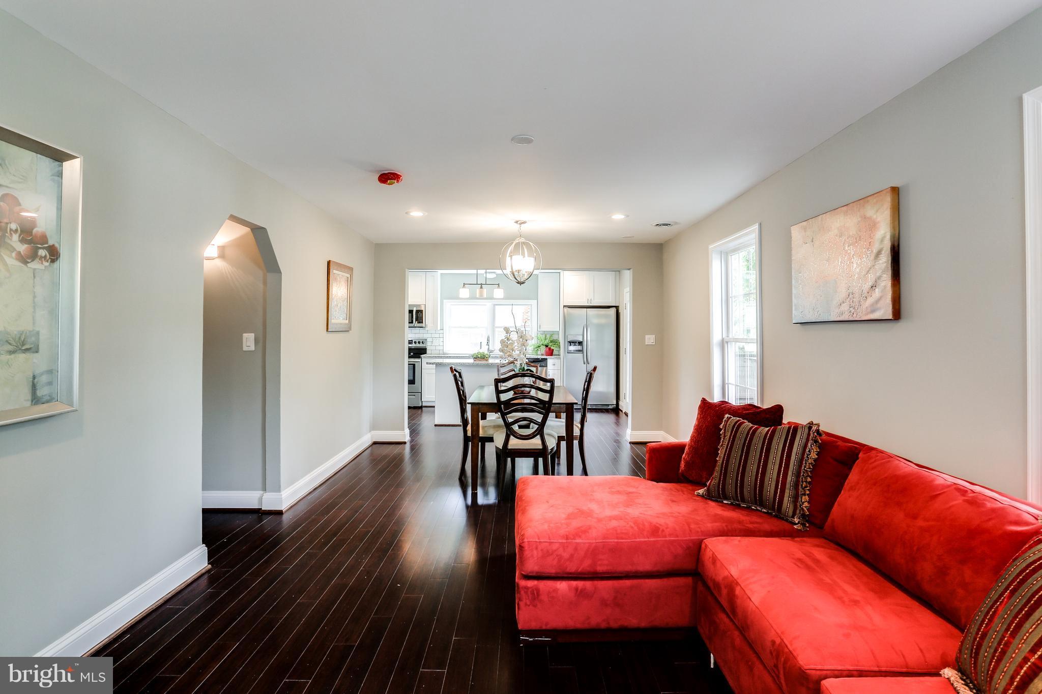 1700 Quantico Road Edgewater, MD 21037 - Photo 14 of 25 a living room with furniture and wooden floor