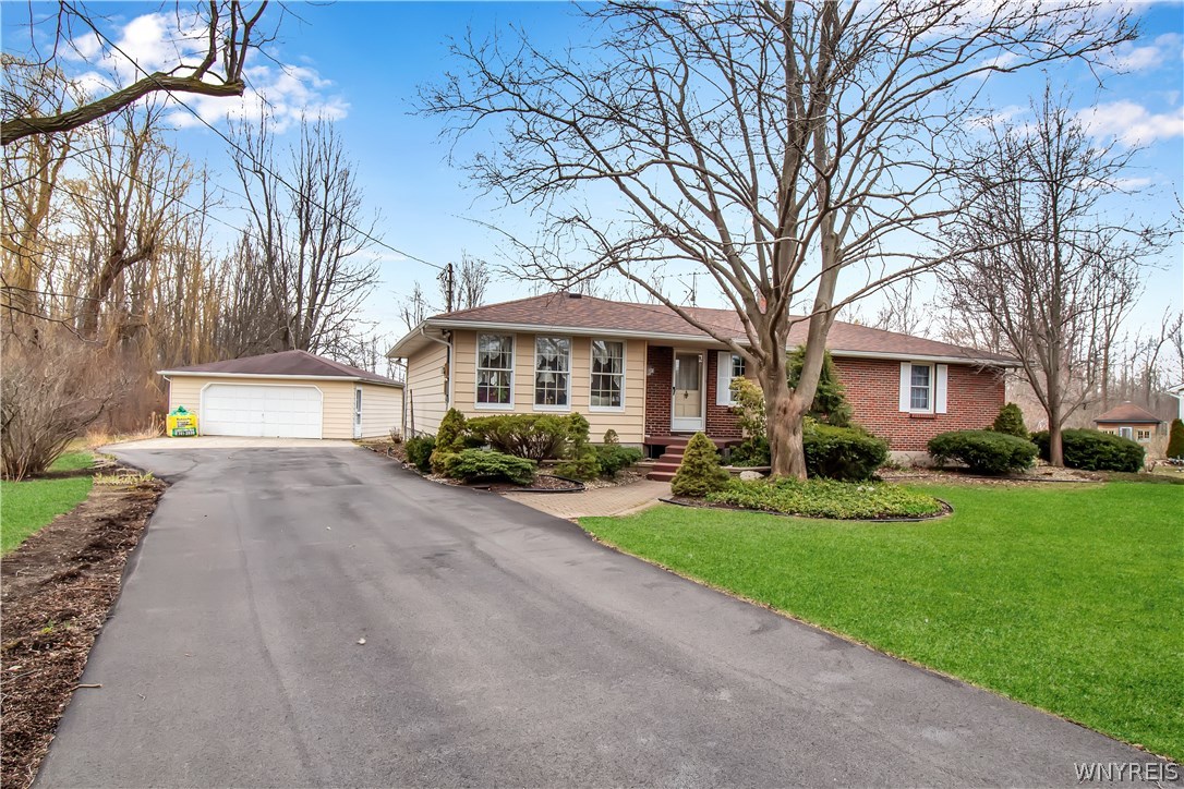 9395 Wolcott Road Clarence, NY 14032 - Photo 1 of 1 Charming 1732 Sq ft Brick Ranch on 1.3 acres, addi