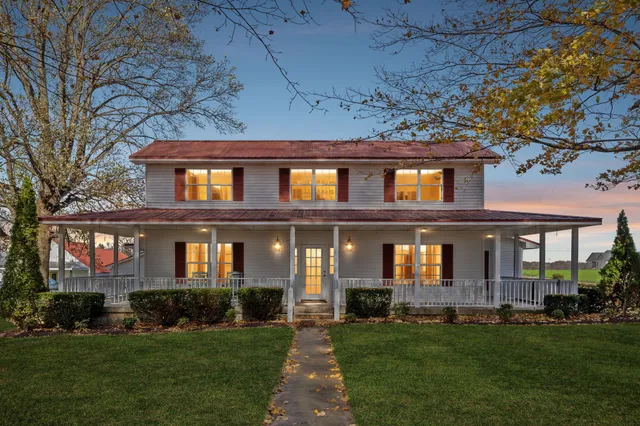 a view of two chairs in balcony