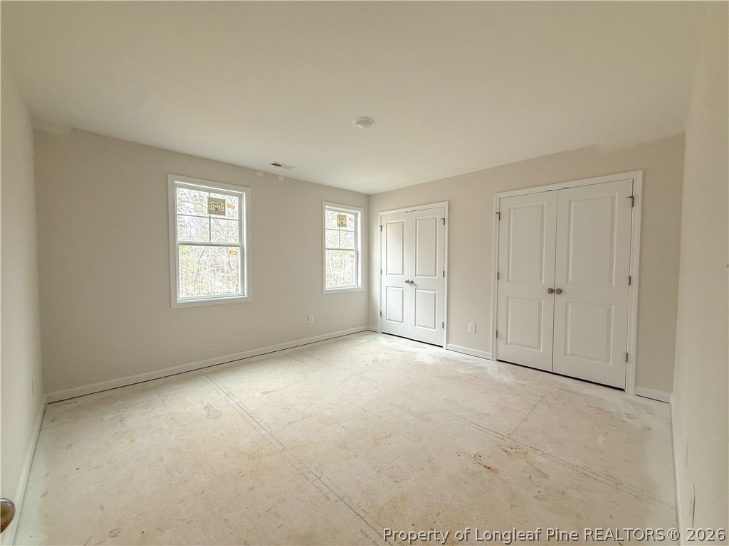 1164 Alex Baker (lot 1) Road Raeford, NC 28376 - Photo 8 of 12 an empty room with windows