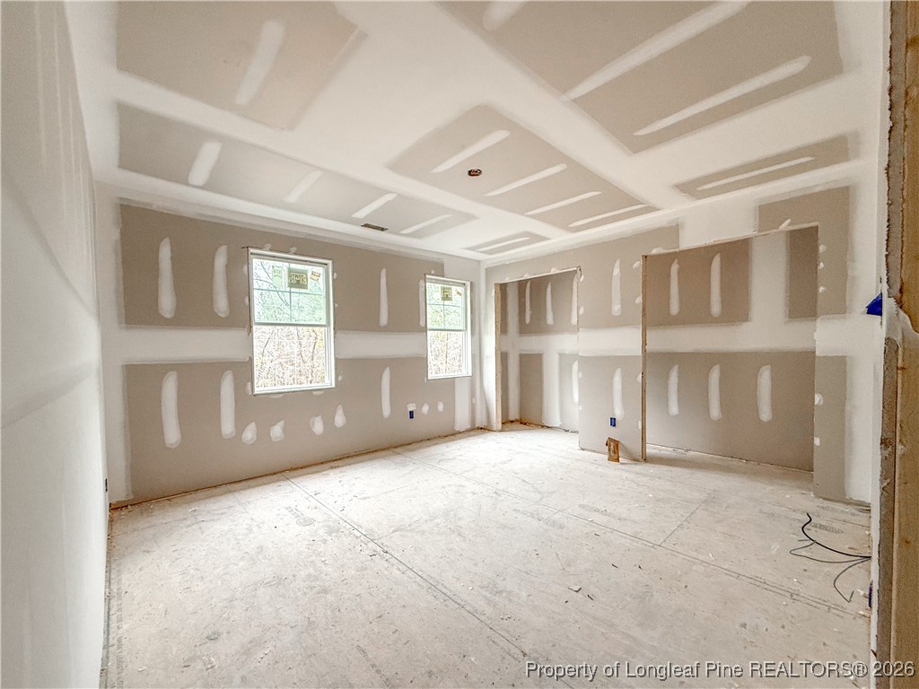 1164 Alex Baker (lot 1) Road Raeford, NC 28376 - Photo 9 of 12 a view of an empty room with a window