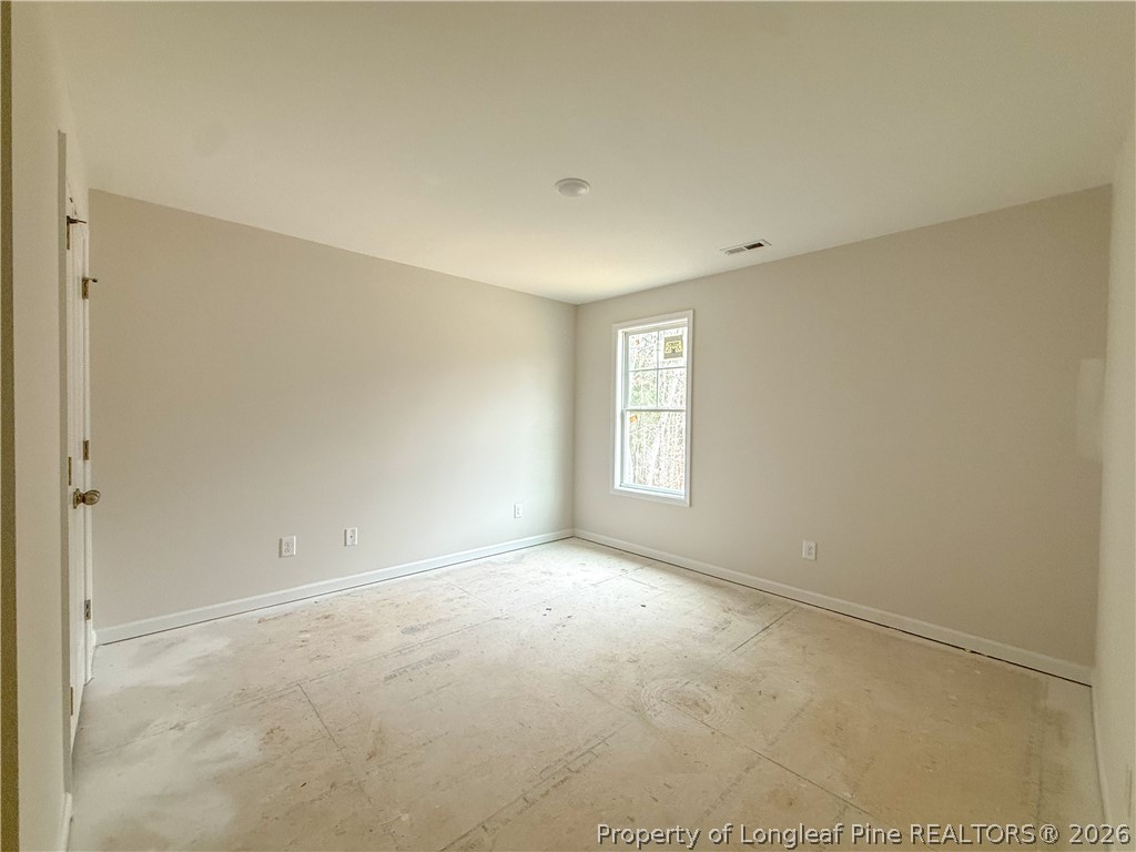 1164 Alex Baker (lot 1) Road Raeford, NC 28376 - Photo 9 of 12 a view of an empty room with a window