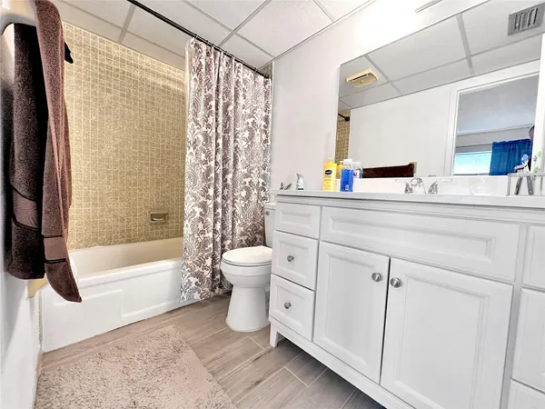 a view of a swimming pool from a balcony