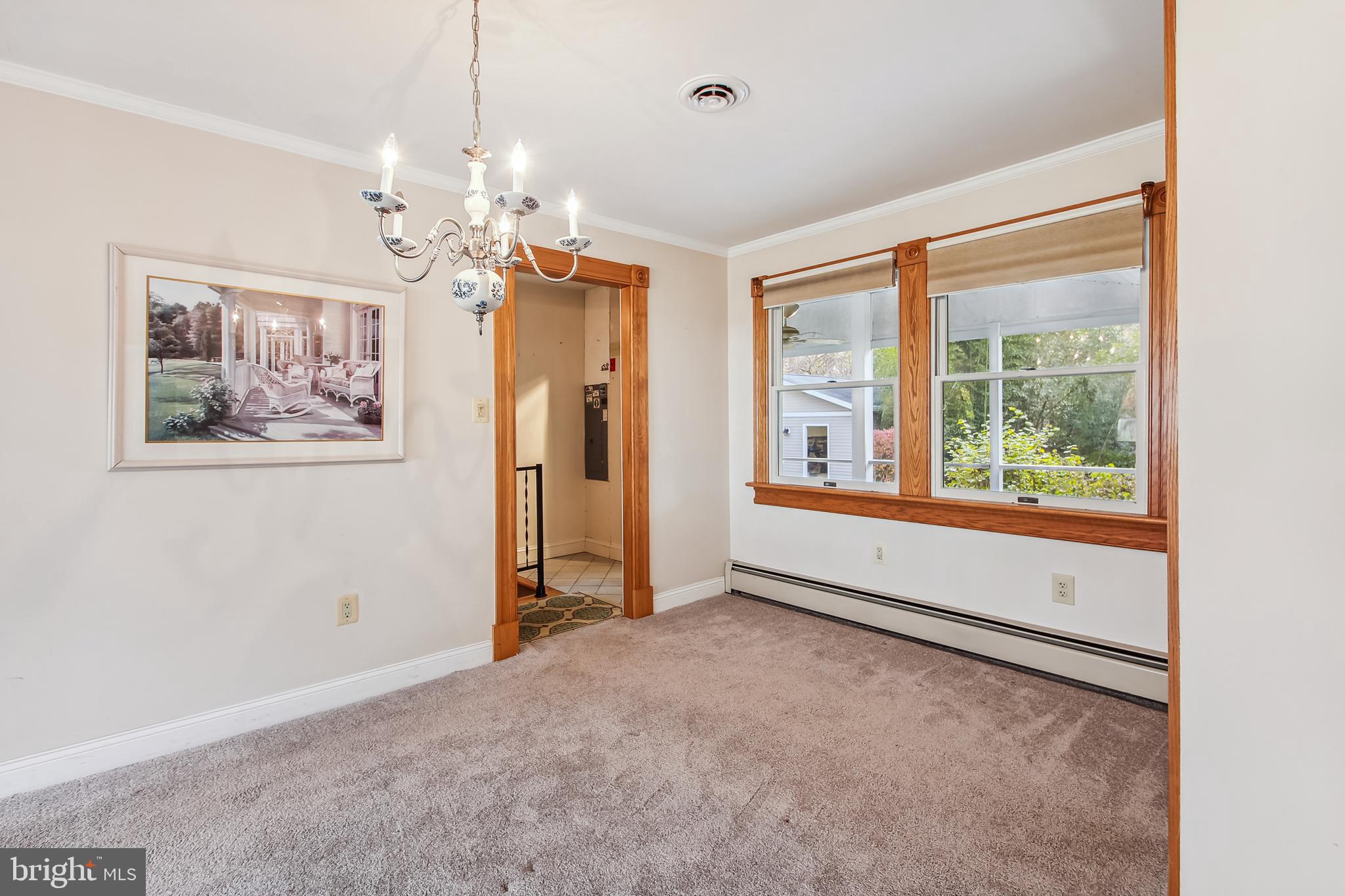 1519 Long Point Road Pasadena, MD 21122 - Photo 23 of 42 Dining room with view to screened porch