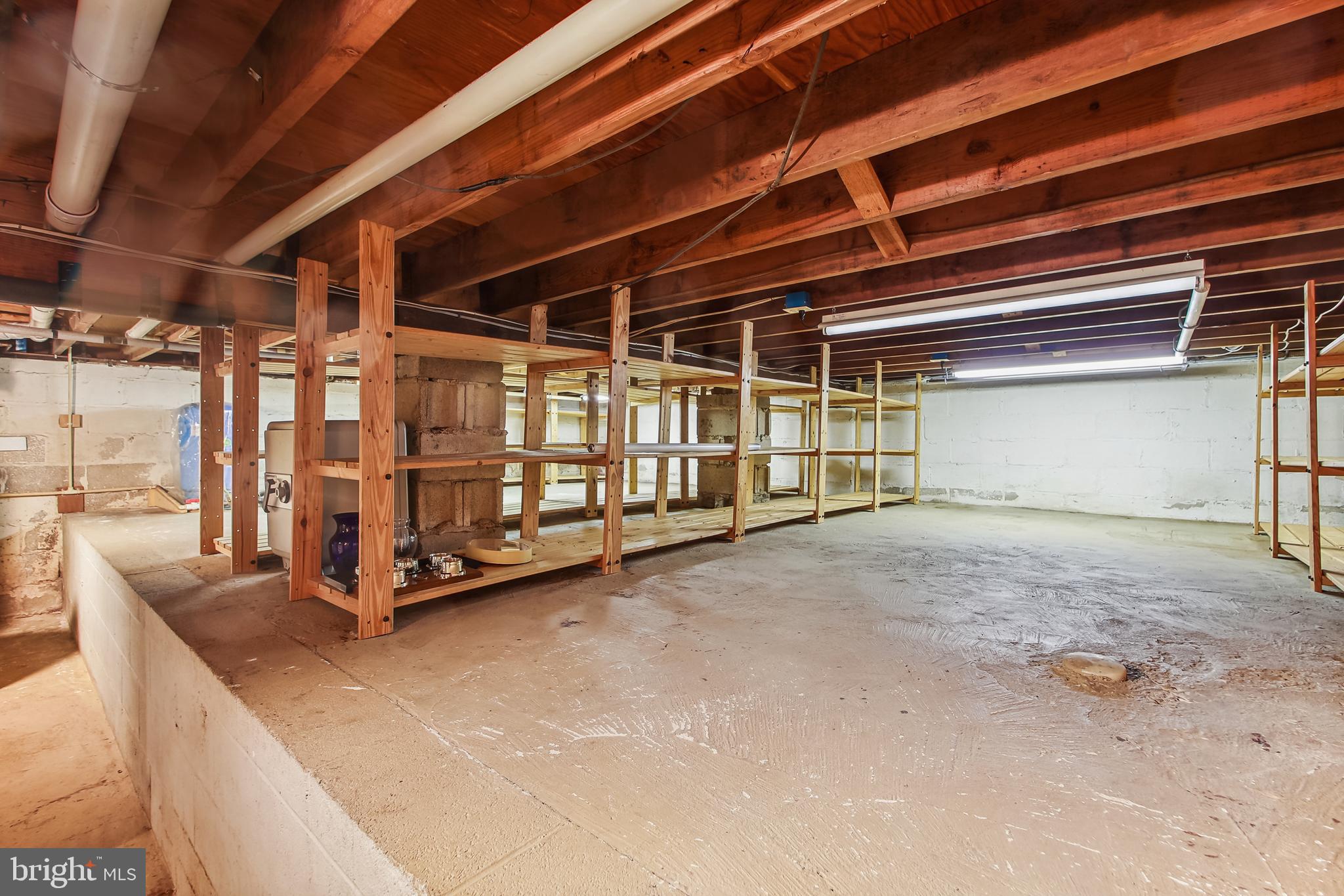 1519 Long Point Road Pasadena, MD 21122 - Photo 41 of 42 Basement crawl space is a large storage area