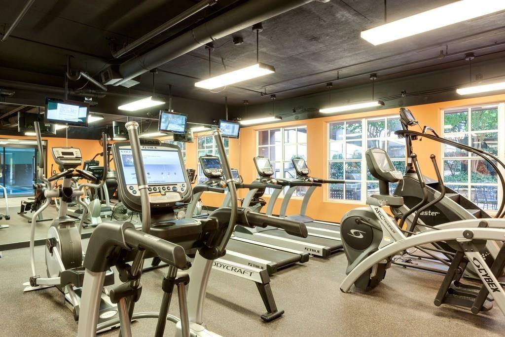 1101 Juniper Street Northeast, Unit 1416 Atlanta, GA 30309 - Photo 44 of 48 a view of a room with gym equipment