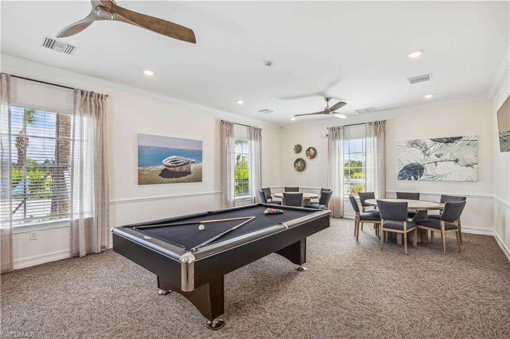 17773 Shade Tree Loop Punta Gorda, FL 33982 - Photo 26 of 44 Game room with ceiling fan, crown molding, plenty of natural light, and carpet