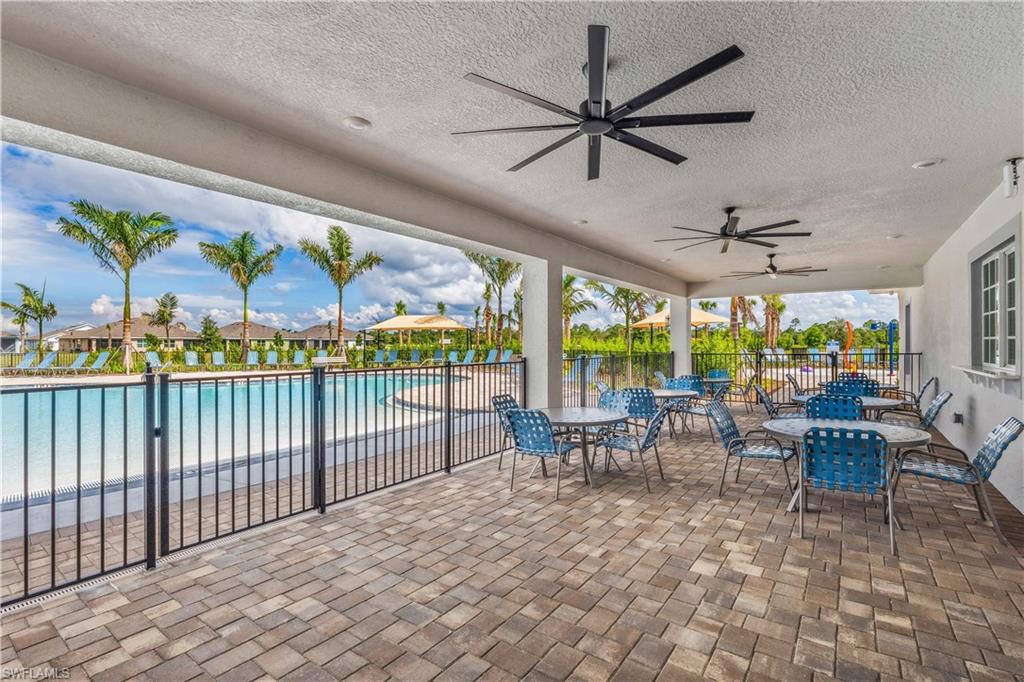 17773 Shade Tree Loop Punta Gorda, FL 33982 - Photo 29 of 44 View of patio / terrace with a community pool and ceiling fan