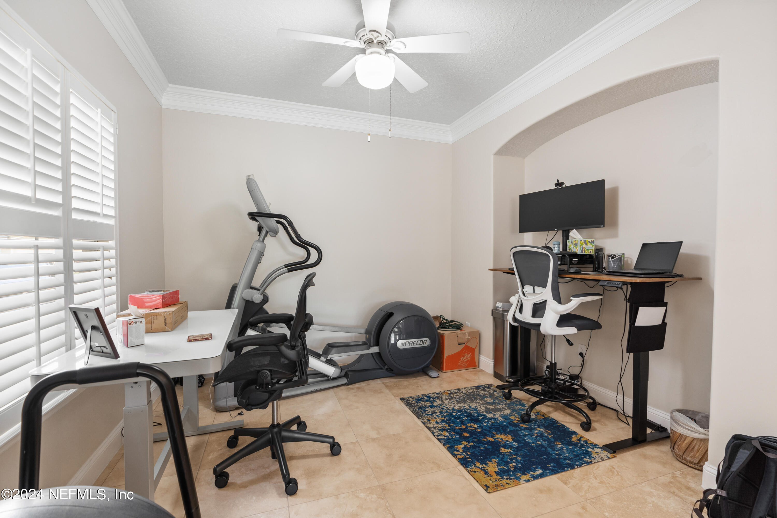 1144 Sandlake Road St. Augustine, FL 32092 - Photo 14 of 15 a view of a workspace with furniture and a window