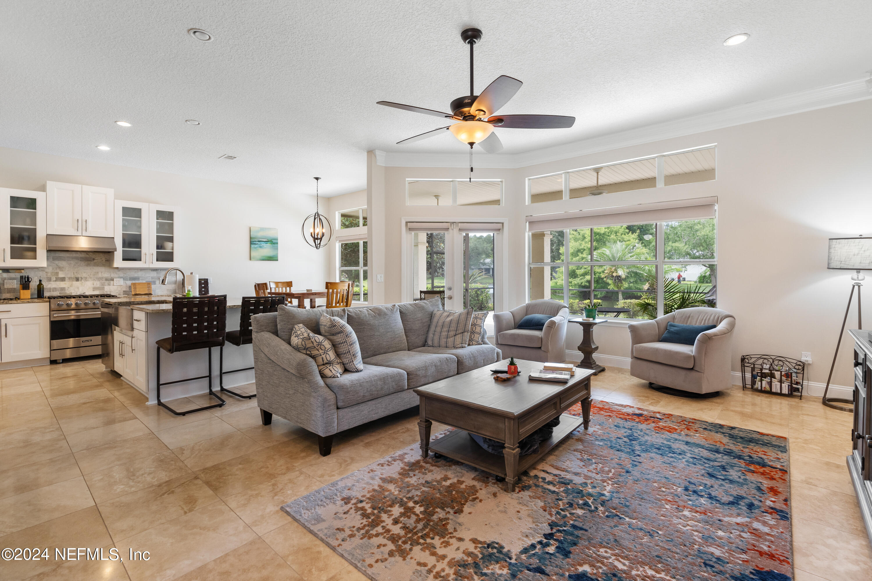 1144 Sandlake Road St. Augustine, FL 32092 - Photo 3 of 15 a living room with furniture and a large window