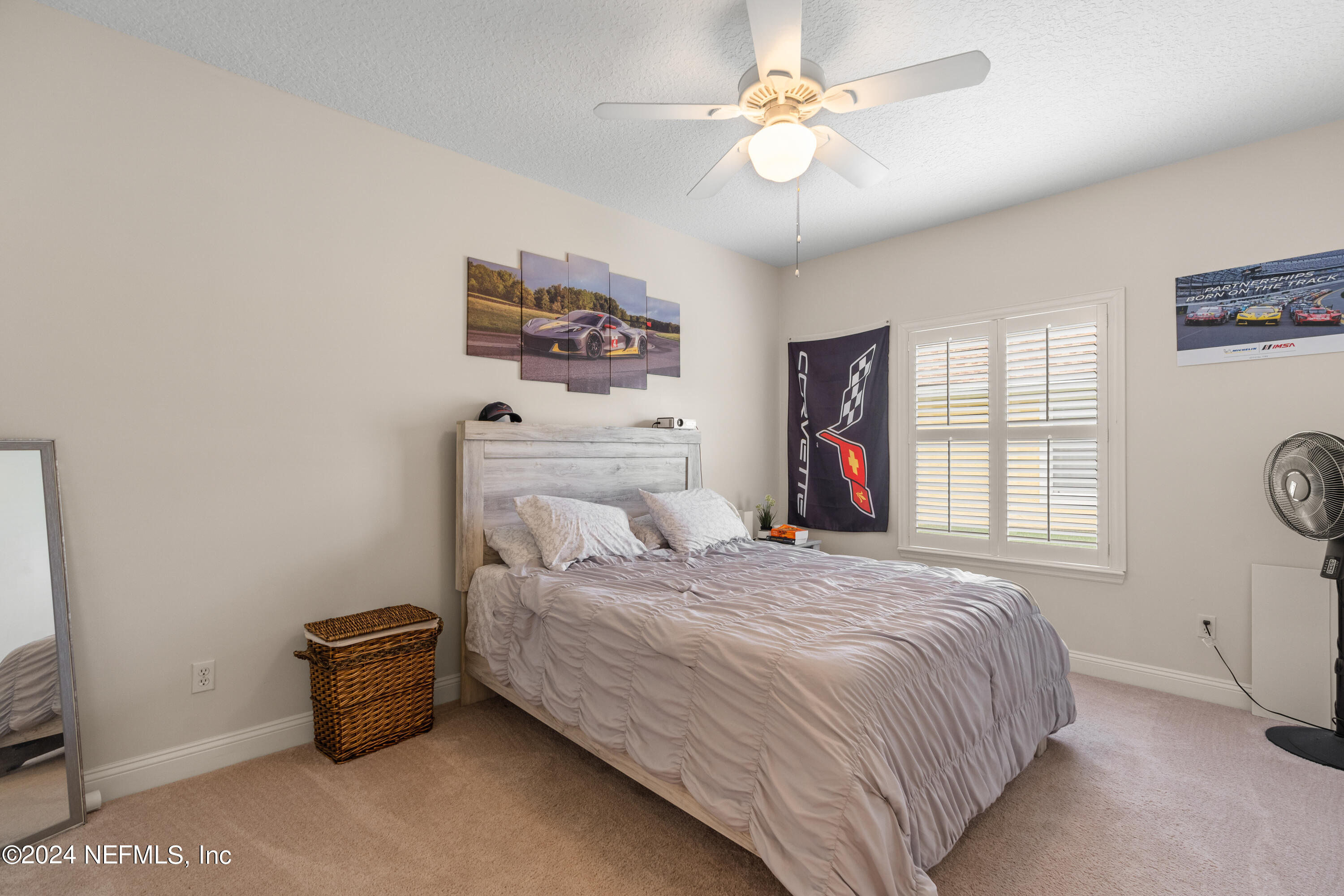 1144 Sandlake Road St. Augustine, FL 32092 - Photo 10 of 15 a bedroom with a bed dresser and a window