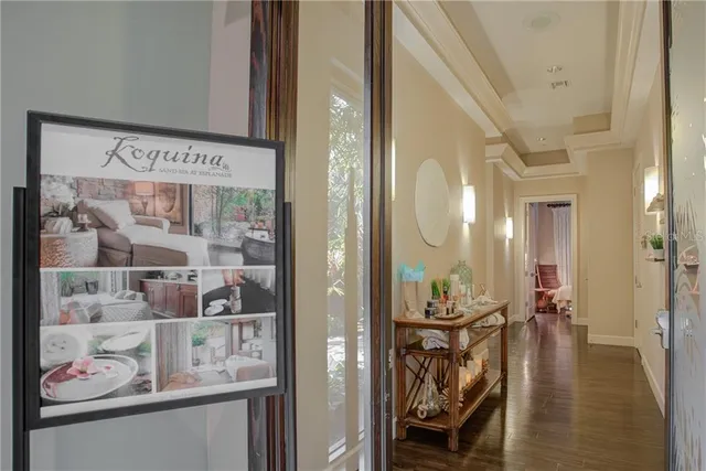 a view of a hallway with dining area