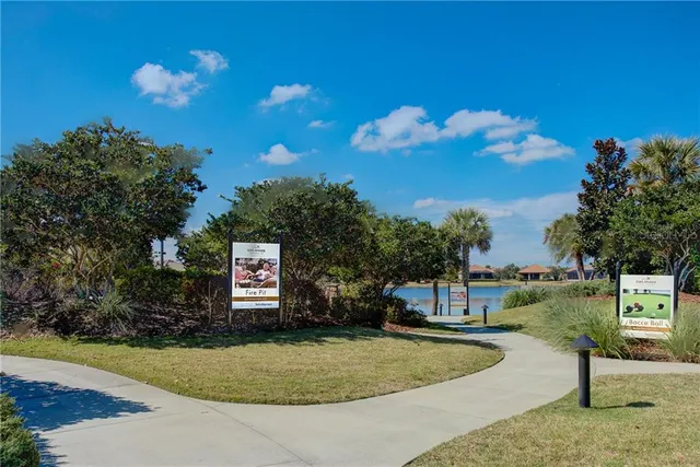 a sign board with a big yard