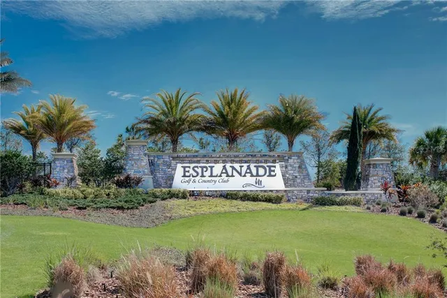 a sign that is sitting in front of a house