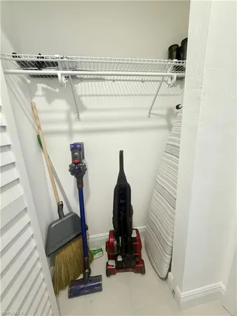a view of a closet with storage