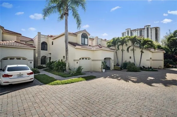 a car parked in front of a house