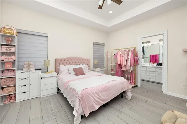 a bedroom with a bed and a cabinets