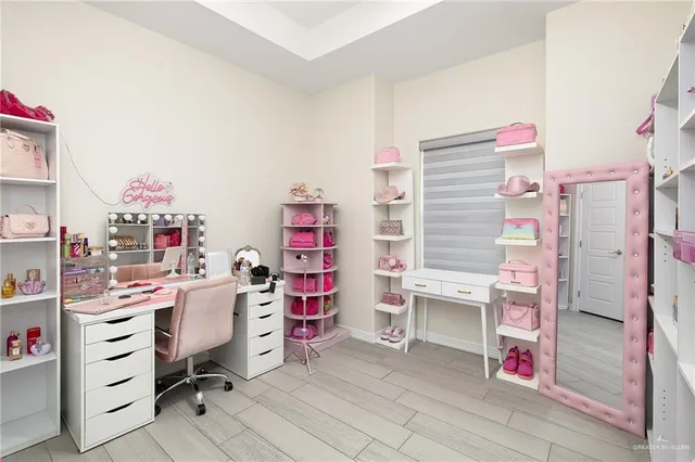 a bedroom with a bed and a cabinets