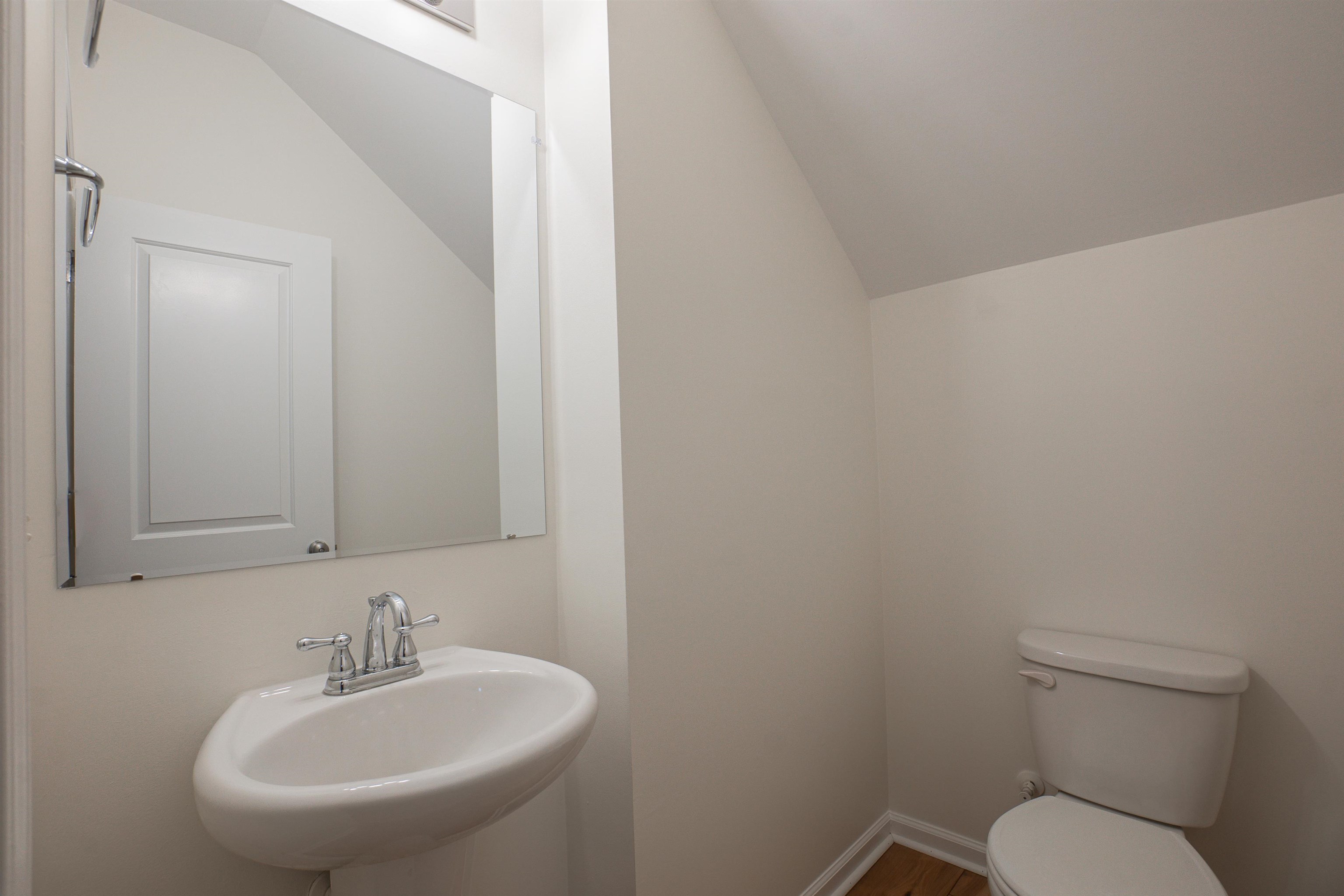 1752 Musket Trail Sumter, SC 29150 - Photo 20 of 37 Half bathroom featuring toilet and vaulted ceiling