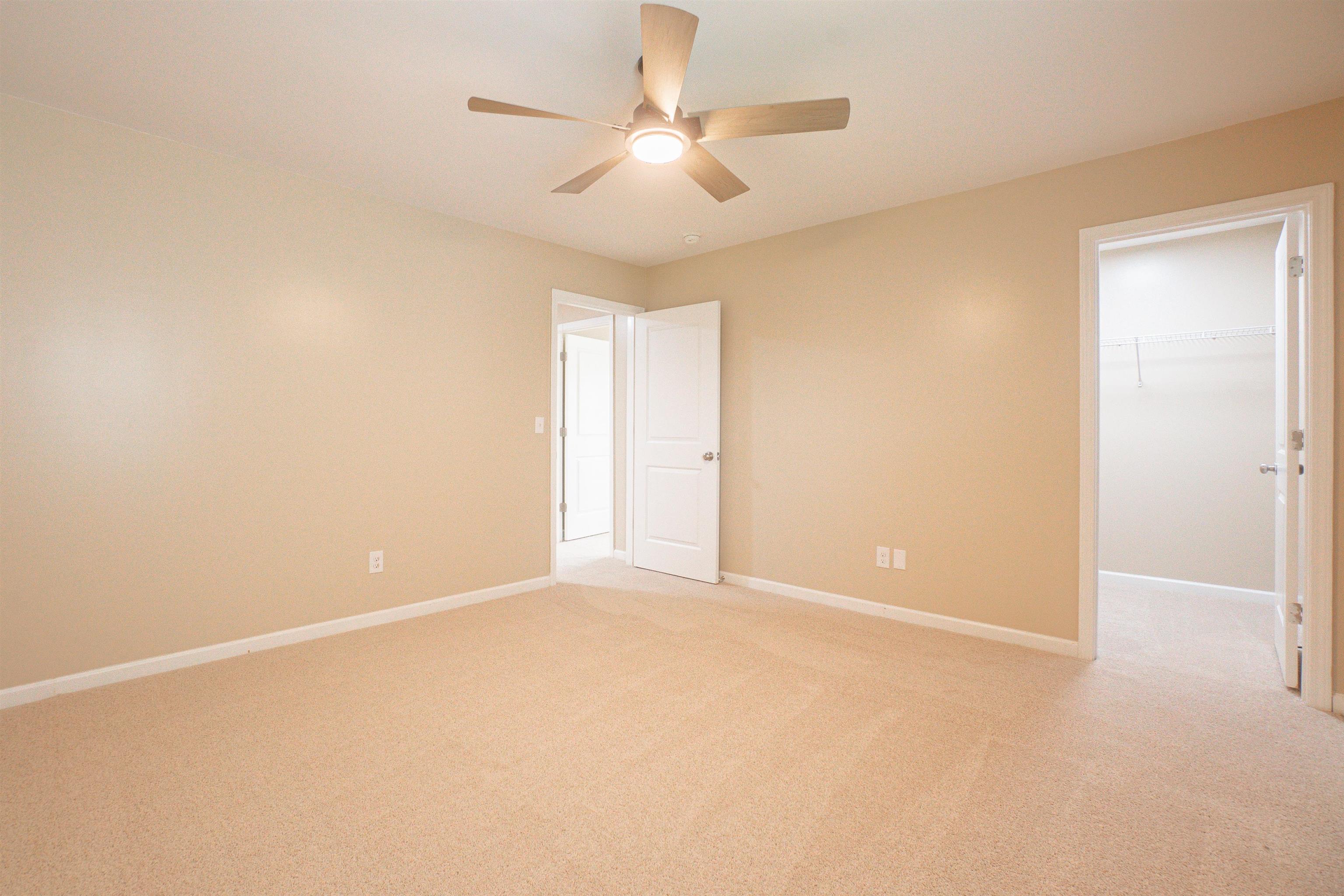 1752 Musket Trail Sumter, SC 29150 - Photo 29 of 37 Spare room featuring light carpet and a ceiling fan