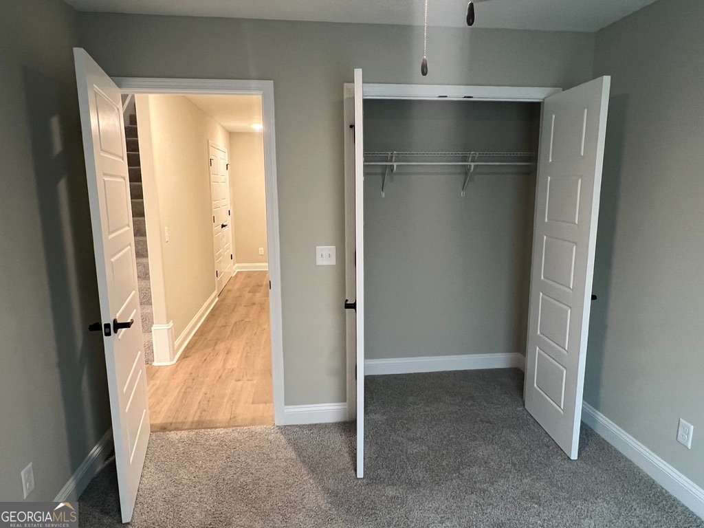 407 Madison Avenue St. Marys, GA 31558 - Photo 6 of 21 an empty room with windows