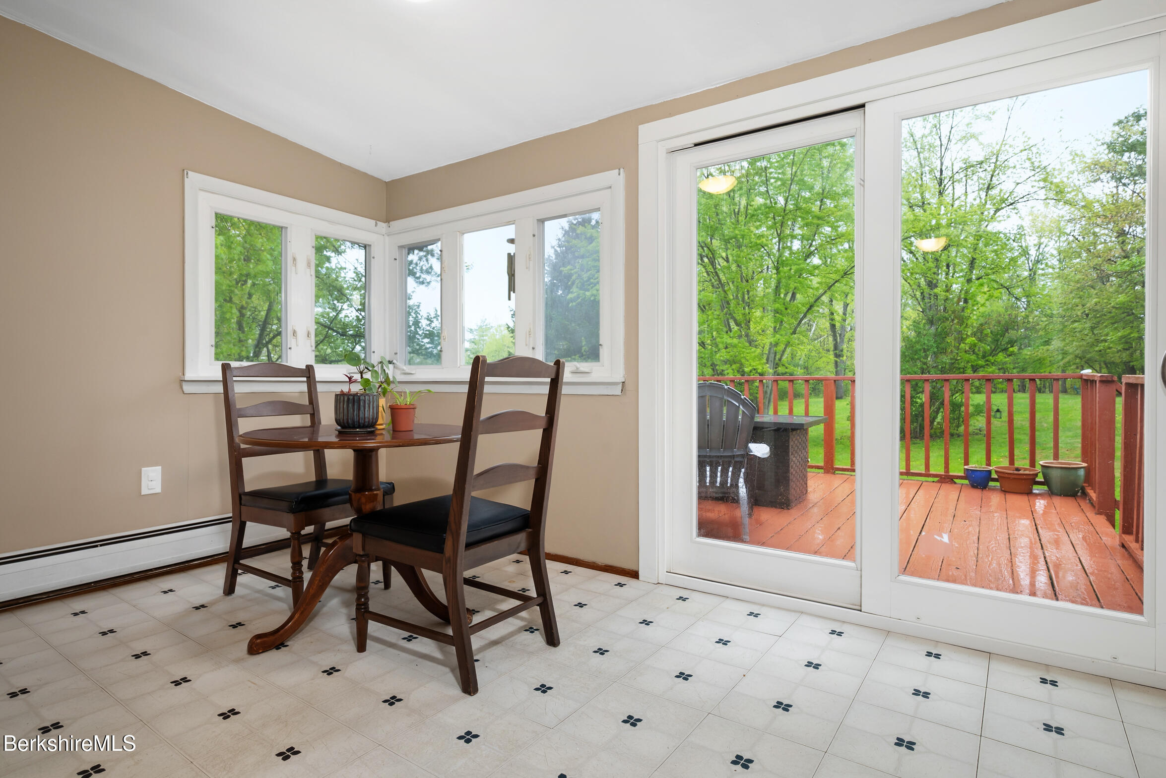 310 Luce Road Williamstown, MA 01267 - Photo 15 of 30 a dining room with furniture and a floor to ceiling window