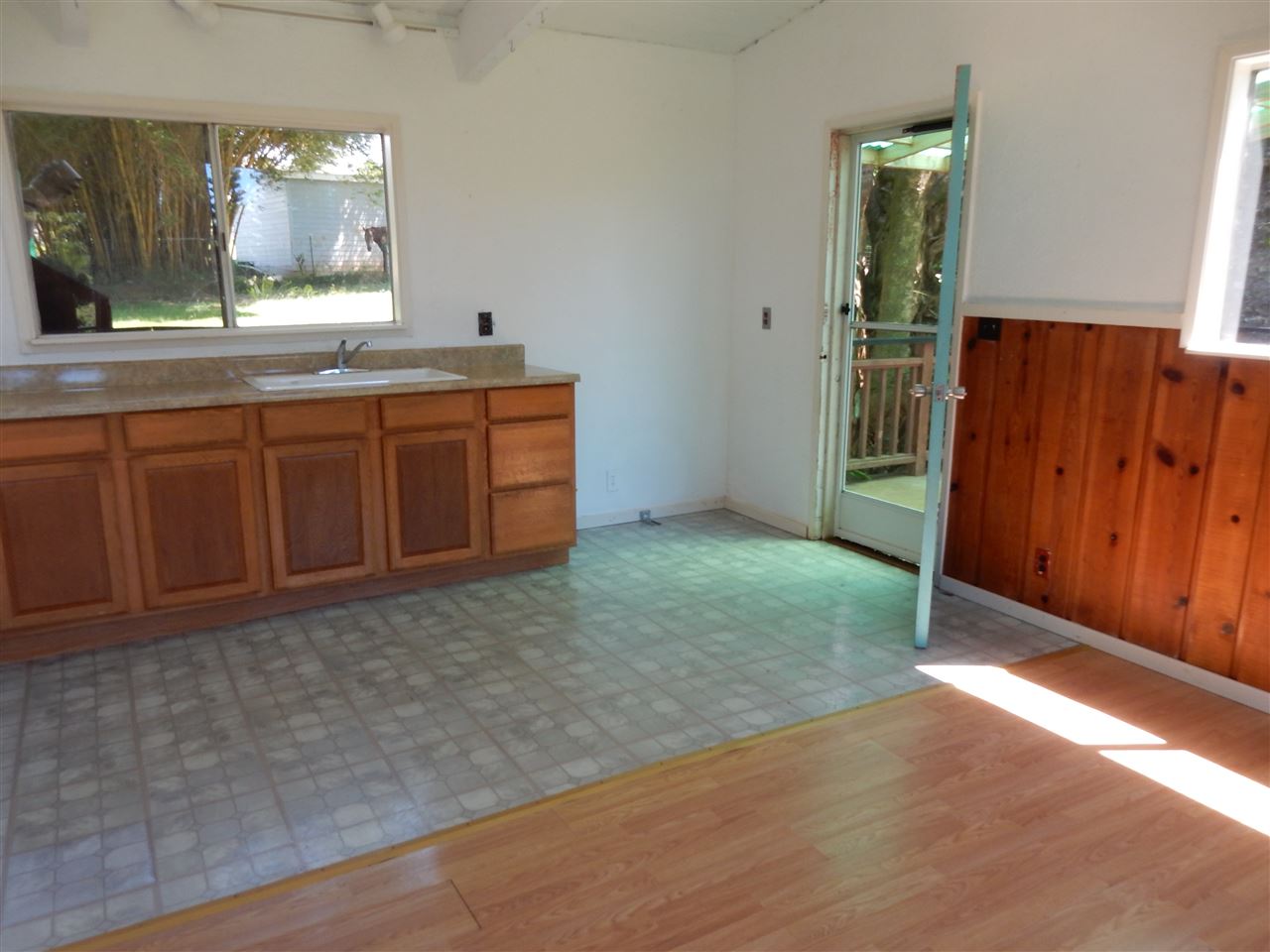 1661 West Kuiaha Road Haiku, HI 96708 - Photo 7 of 16 an empty room with windows and cabinet