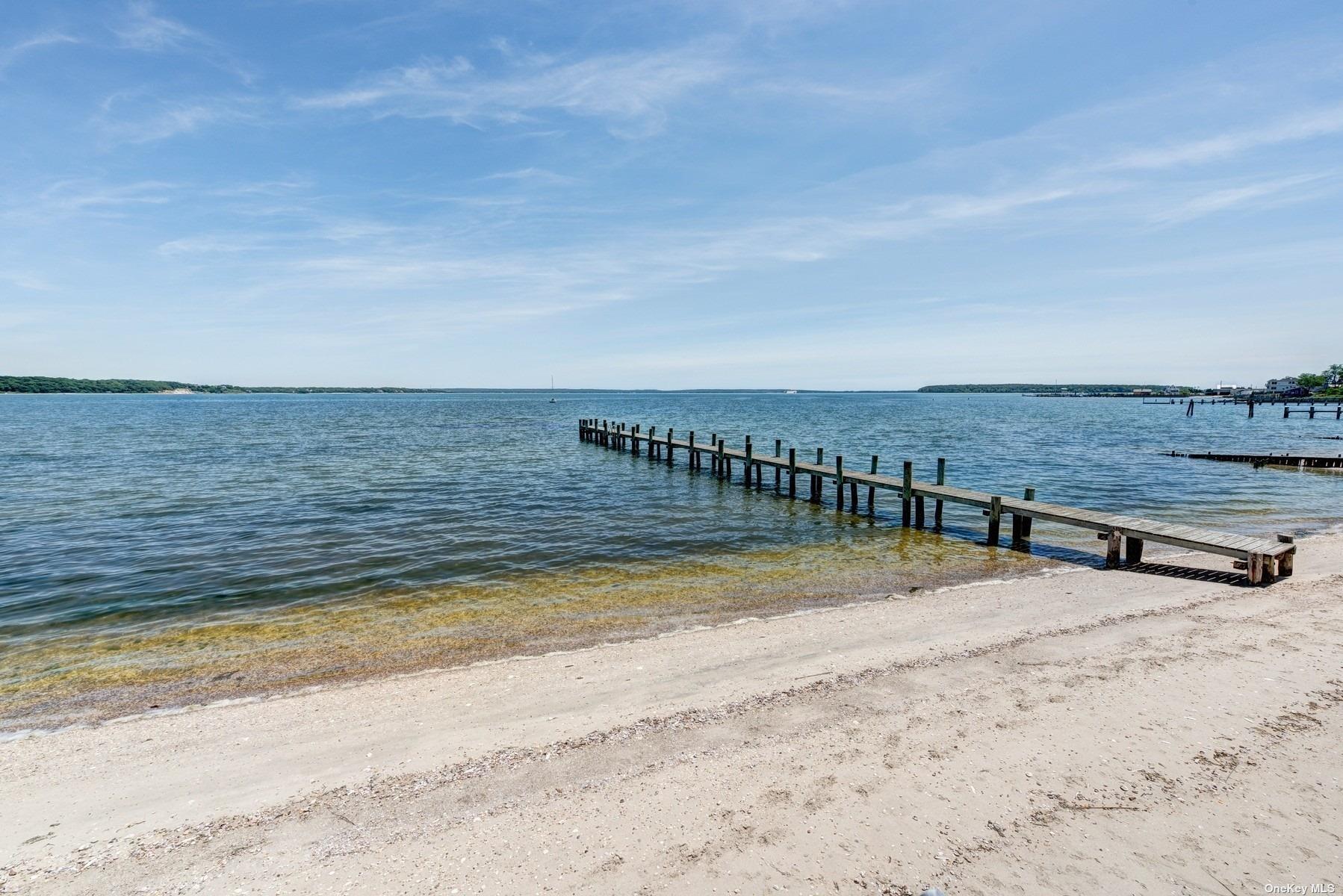 199 Old Harbor Road New Suffolk, NY 11956 - Photo 6 of 15 a view of a terrace view
