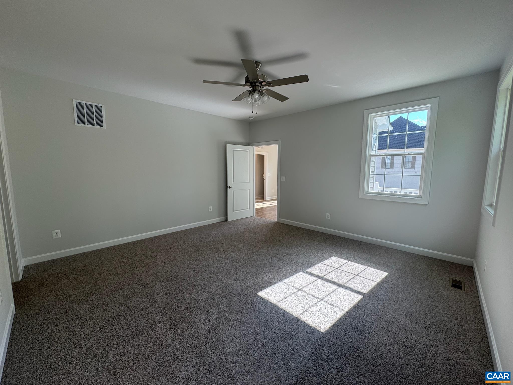 3441 Odom Court Charlottesville, VA 22901 - Photo 18 of 29 an empty room with windows and fan