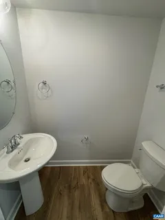 a bathroom with a toilet and a sink