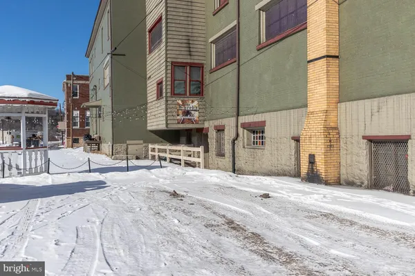 a living room with a couch and a table
