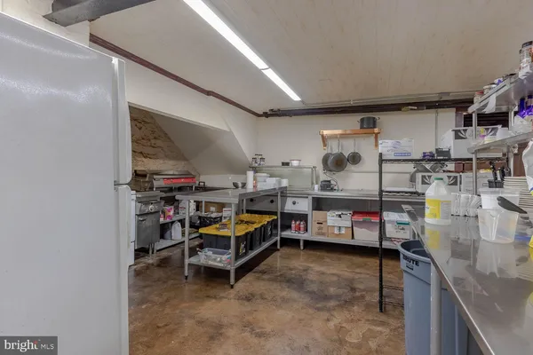 a view of a brick building next to a yard