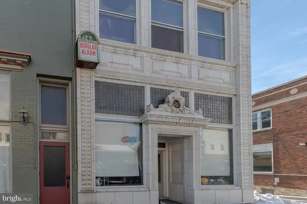 a view of a street with cars