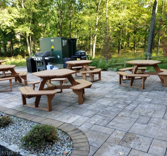 10 Lower Notch Road, Unit 11 Woodland Park, NJ 07424 - Photo 26 of 37 a view of a backyard with sitting area