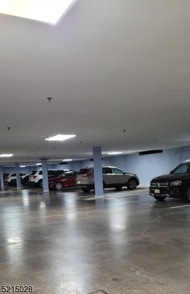 10 Lower Notch Road, Unit 11 Woodland Park, NJ 07424 - Photo 35 of 37 a view of a room with gym equipment