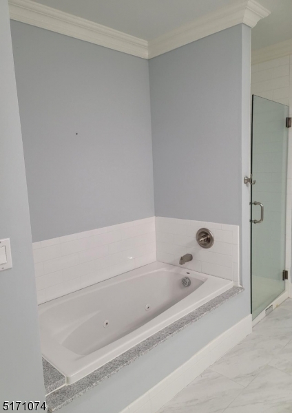 10 Lower Notch Road, Unit 11 Woodland Park, NJ 07424 - Photo 7 of 37 a bathroom with a bathtub and shower
